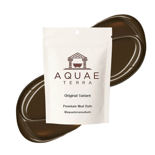 Aquae Terra Mud Bath - front of pack on dark brown mud texture swatch